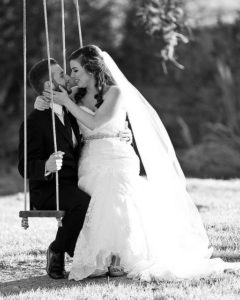 Swinging with Shawn and Brittany at their Pecan Springs Ranch Austin Wedding by Sprittibee Photography